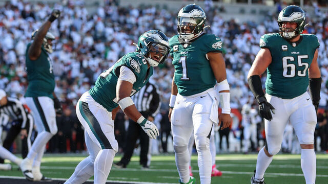 CINCINNATI, OH - OCTOBER 27: Philadelphia Eagles running back Saquon Barkley (26) reacts with quarterback Jalen Hurts (1) and offensive tackle Lane Johnson (65) during the game against the Philadelphia Eagles and the Cincinnati Bengals on October 27, 2024, at Paycor Stadium in Cincinnati, OH.
