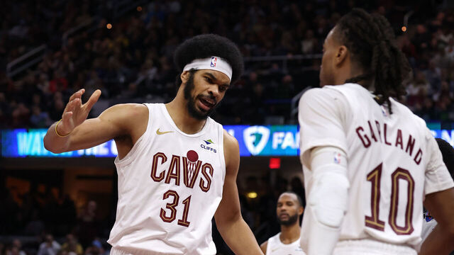CLEVELAND, OH - JANUARY 8: Jarrett Allen #31 of the Cleveland Cavaliers high fives Darius Garland #10 during the game against the Oklahoma City Thunder on January 8, 2025 at Rocket Mortgage FieldHouse in Cleveland, Ohio. NOTE TO USER: User expressly acknowledges and agrees that, by downloading and/or using this Photograph, user is consenting to the terms and conditions of the Getty Images License Agreement. Mandatory Copyright Notice: Copyright 2025 NBAE