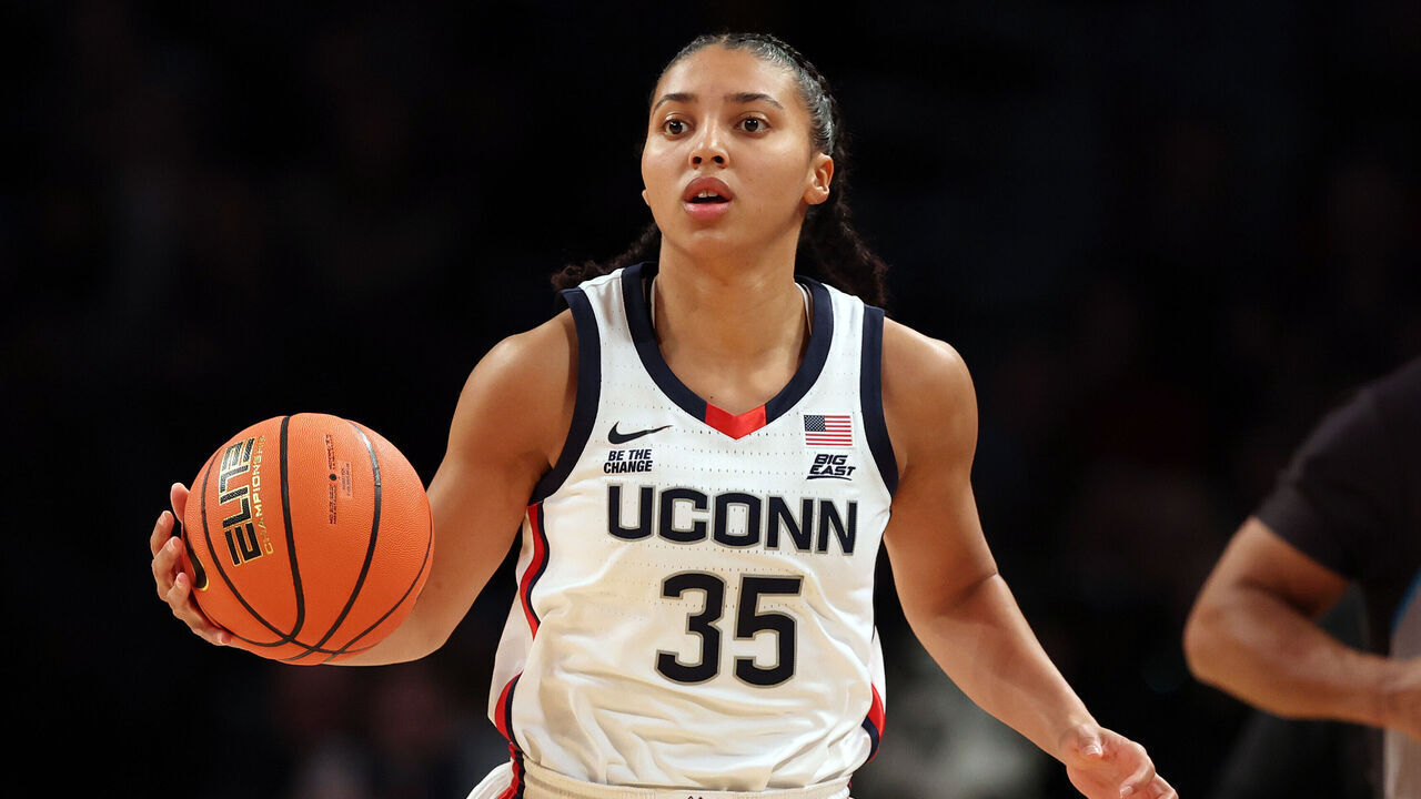 NEW YORK, NEW YORK - DECEMBER 07: Azzi Fudd #35 of the UConn Huskies dribbles during the first half against the Louisville Cardinals in the Shark Beauty Women's Champions Classic at Barclays Center on December 07, 2024 in the Brooklyn borough of New York City.