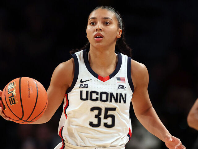 NEW YORK, NEW YORK - DECEMBER 07: Azzi Fudd #35 of the UConn Huskies dribbles during the first half against the Louisville Cardinals in the Shark Beauty Women's Champions Classic at Barclays Center on December 07, 2024 in the Brooklyn borough of New York City.