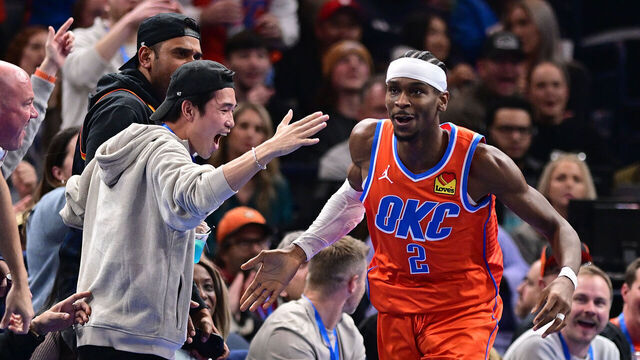OKLAHOMA CITY, OKLAHOMA - DECEMBER 10: Shai Gilgeous-Alexander #2 of the Oklahoma City Thunder celebrates with fans during the second half against the Dallas Mavericks at Paycom Center on December 10, 2024 in Oklahoma City, Oklahoma.