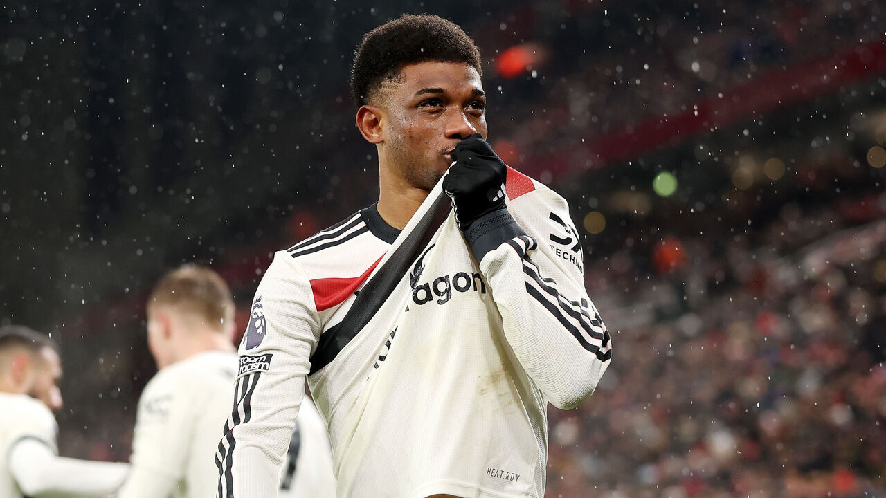 LIVERPOOL, ENGLAND - JANUARY 05: Amad Diallo of Manchester United celebrates after scoring his team's second goal during the Premier League match between Liverpool FC and Manchester United FC at Anfield on January 05, 2025 in Liverpool, England.