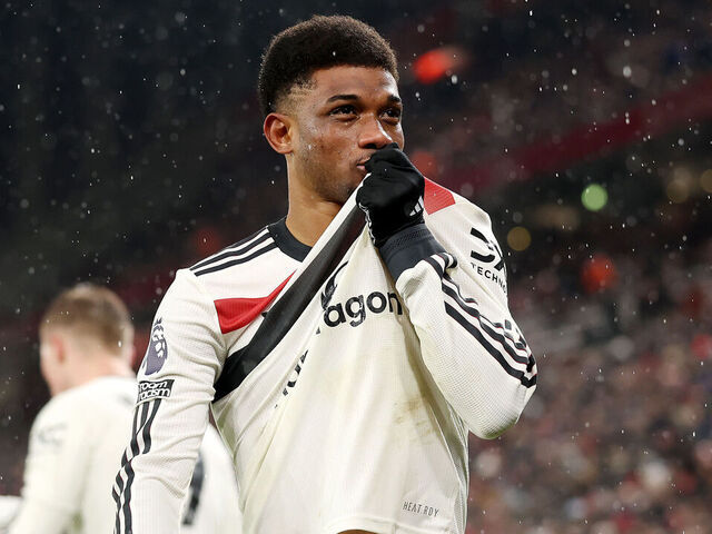 LIVERPOOL, ENGLAND - JANUARY 05: Amad Diallo of Manchester United celebrates after scoring his team's second goal during the Premier League match between Liverpool FC and Manchester United FC at Anfield on January 05, 2025 in Liverpool, England.