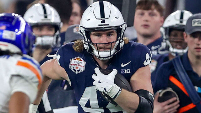 GLENDALE, AZ - DECEMBER 31: Penn State Nittany Lions tight end Tyler Warren (44) looks for running room after making a reception during the CFP Quarterfinal Vrbo Fiesta Bowl featuring the Penn State Nittany Lions vs. the Boise State Broncos on December 31, 2024 at State Farm Stadium in Glendale, Arizona.