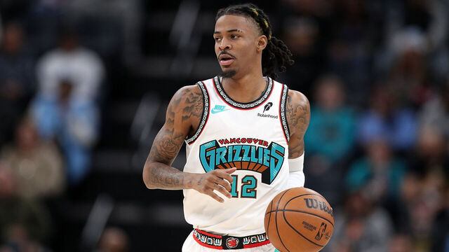 MEMPHIS, TENNESSEE - DECEMBER 23: Ja Morant #12 of the Memphis Grizzlies brings the ball up court during the game against the LA Clippers at FedExForum on December 23, 2024 in Memphis, Tennessee.
