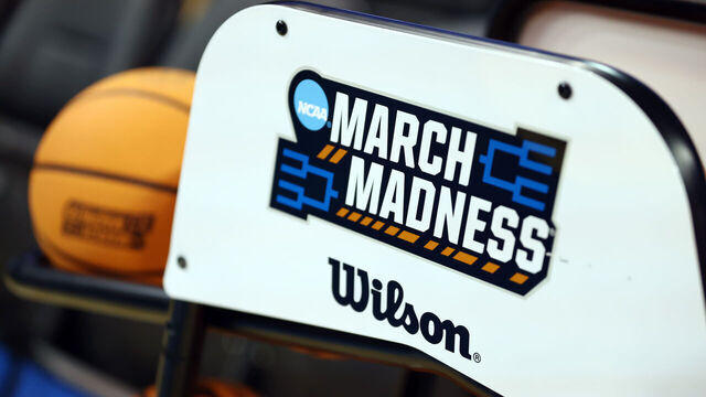 LOS ANGELES, CALIFORNIA - DECEMBER 16: The NCAA March Madness logo on a basketball rack prior to the game between the UCLA Bruins and the Cal Poly Mustangs at UCLA Pauley Pavilion on December 16, 2024 in Los Angeles, California.