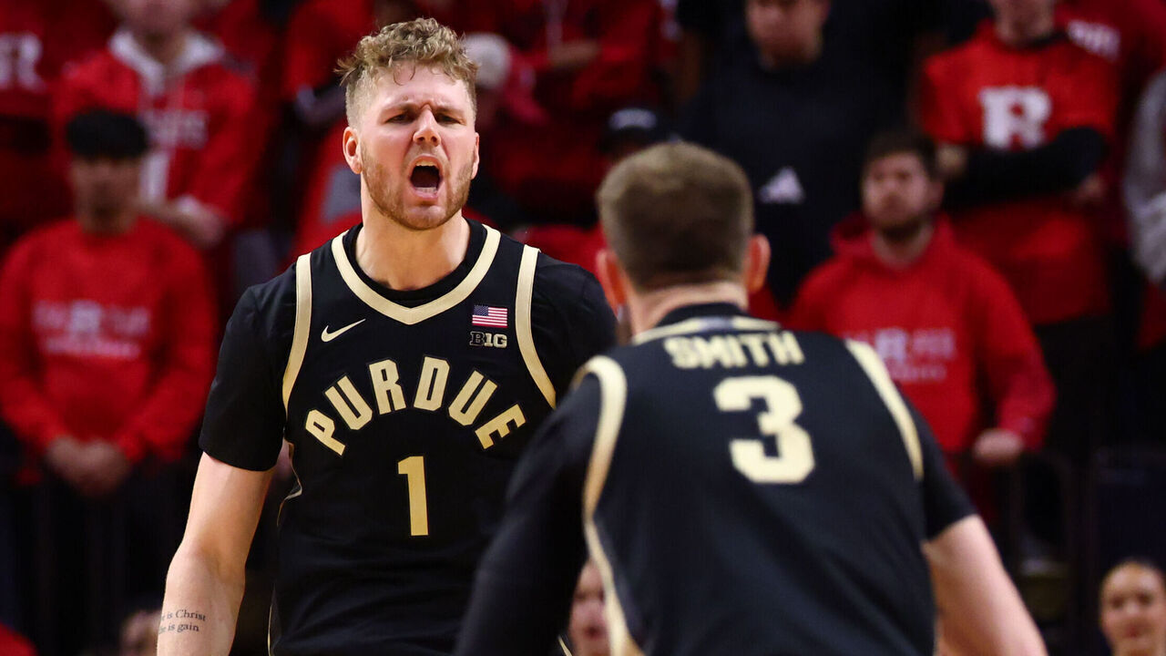 PISCATAWAY, NEW JERSEY - JANUARY 9: Caleb Furst #1 celebrates a dunk with Braden Smith #3 of the Purdue Boilermakers during the second half against the Rutgers Scarlet Knights at Jersey Mike's Arena on January 9, 2025 in Piscataway, New Jersey.