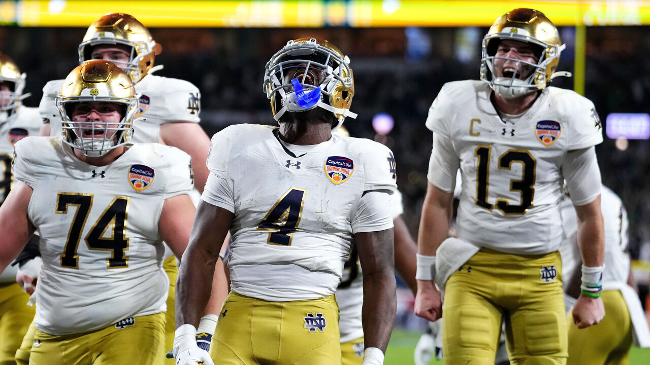 MIAMI GARDENS, FLORIDA - JANUARY 09: Jeremiyah Love #4 of the Notre Dame Fighting Irish celebrates with teammates after running the ball for a touchdown during the fourth quarter against the Penn State Nittany Lions in the Capital One Orange Bowl at Hard Rock Stadium on January 09, 2025 in Miami Gardens, Florida.