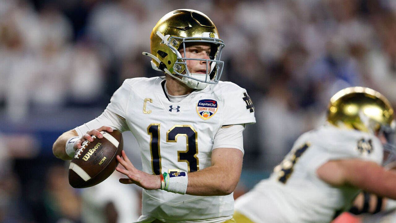MIAMI GARDENS, FL - JANUARY 09: Quarterback Riley Leonard #13 of the Notre Dame Fighting Irish gets ready to throw the ball during the game between the Penn State Nittany Lions versus Notre Dame Fighting Irish College Football Playoff Semifinal at the Capital One Orange Bowl on January 9, 2025, at Hard Rock Stadium in Miami Gardens, FL.