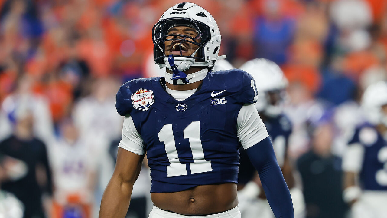 GLENDALE, AZ - DECEMBER 31: Defensive End Abdul Carter #11 of the Penn State Nittany Lions reacts after a big play during the Penn State Nittany Lions versus Boise State Broncos College Football Playoff Quarterfinal at the Vrbo Fiesta Bowl on December 31,2024, at State Farm Stadium in Glendale, AZ.