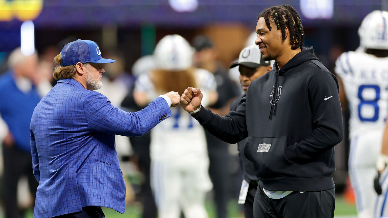 ATLANTA, GEORGIA - DECEMBER 24: General Manager Chris Ballard of the Indianapolis Colts speaks with Anthony Richardson #5 of the Indianapolis Colts prior to the game against the Atlanta Falcons at Mercedes-Benz Stadium on December 24, 2023 in Atlanta, Georgia.
