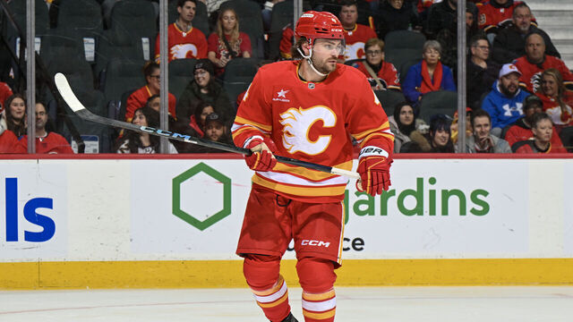 CALGARY, ALBERTA - DECEMBER 14: Rasmus Andersson #4 of the Calgary Flames skates against the Florida Panthers at the Scotiabank Saddledome on December 14, 2024 in Calgary, Alberta.