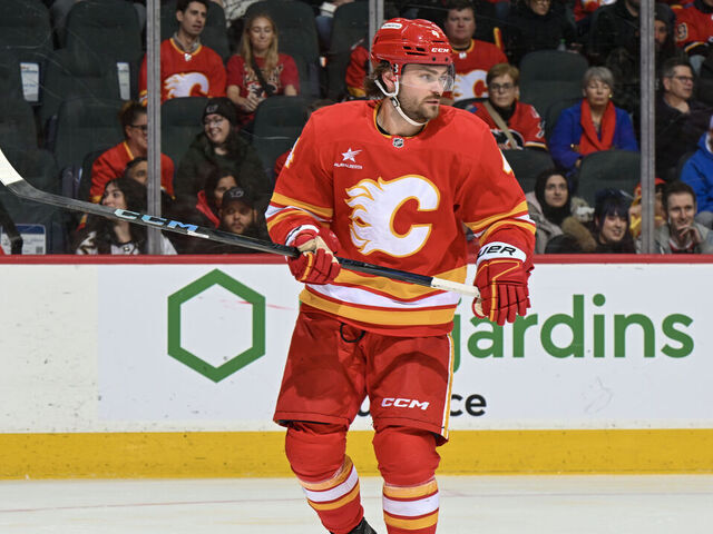 CALGARY, ALBERTA - DECEMBER 14: Rasmus Andersson #4 of the Calgary Flames skates against the Florida Panthers at the Scotiabank Saddledome on December 14, 2024 in Calgary, Alberta.