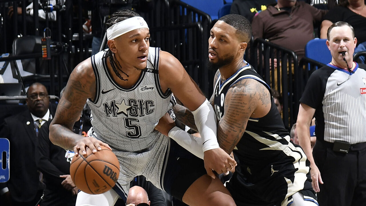 ORLANDO, FL - JANUARY 10: Paolo Banchero #5 of the Orlando Magic handles the ball during the game against the Milwaukee Bucks on January 10, 2025 at Kia Center in Orlando, Florida. Mandatory Copyright Notice: Copyright 2025 NBAE