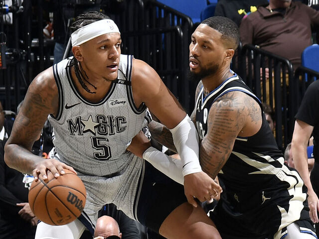 ORLANDO, FL - JANUARY 10: Paolo Banchero #5 of the Orlando Magic handles the ball during the game against the Milwaukee Bucks on January 10, 2025 at Kia Center in Orlando, Florida. Mandatory Copyright Notice: Copyright 2025 NBAE