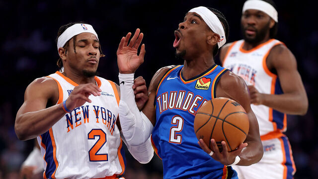 NEW YORK, NEW YORK - JANUARY 10: Shai Gilgeous-Alexander #2 of the Oklahoma City Thunder heads for the net as Miles McBride #2 of the New York Knicks defends during the first half at Madison Square Garden on January 10, 2025 in New York City.