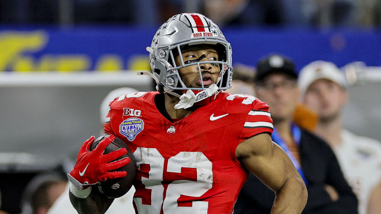 ARLINGTON, TX - JANUARY 10: Running Back TreVeyon Henderson #32 of the Ohio State Buckeyes runs for a touchdown during the Ohio State Buckeyes versus Texas Longhorns College Football Playoff Semifinal at the Cotton Bowl Classic on January 10, 2025, at AT&T Stadium in Arlington, TX.
