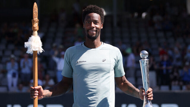 Gael Monfils of France poses with the trophy as he celebrates his win over Zizou Berges of Belgium following their men's singles final match at the ATP Auckland Classic tennis tournament in Auckland on January 11, 2025.