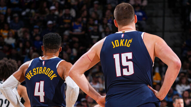 DENVER, CO - JANUARY 10: Russell Westbrook #4 and Nikola Jokic #15 of the Denver Nuggets look on during the game against the Brooklyn Nets on January 10, 2025 at Ball Arena in Denver, Colorado. NOTE TO USER: User expressly acknowledges and agrees that, by downloading and/or using this Photograph, user is consenting to the terms and conditions of the Getty Images License Agreement. Mandatory Copyright Notice: Copyright 2025 NBAE