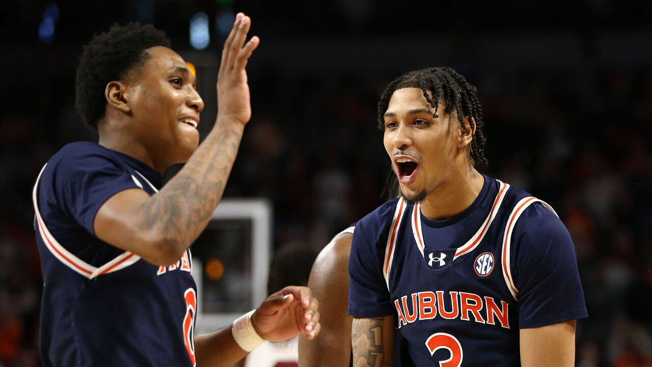 COLUMBIA, SOUTH CAROLINA - JANUARY 11: Jahki Howard #3 of the Auburn Tigers reacts with Tahaad Pettiford #0 of the Auburn Tigers after a free throw during the second half against the South Carolina Gamecocks at Colonial Life Arena on January 11, 2025 in Columbia, South Carolina.