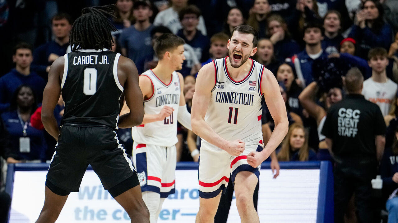 STORRS, CONNECTICUT - JANUARY 5: Alex Karaban #11 of the Connecticut Huskies reacts during the second half of an NCAA basketball game against the Providence Friars at the Harry A. Gampel Pavilion on January 5, 2025 in Storrs, Connecticut.