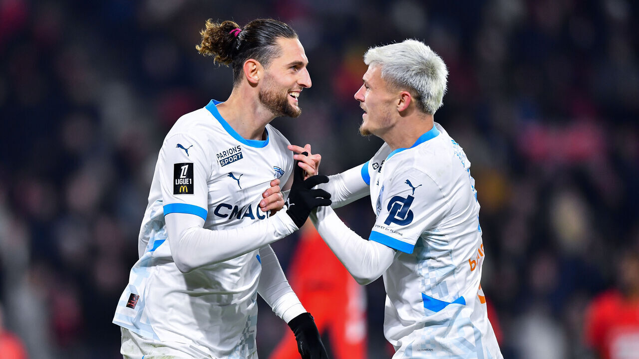 RENNES, FRANCE - JANUARY 11: Adrien Rabiot of Olympique de Marseille celebrates with Quentin Merlin of Olympique de Marseille after scoring his team's second goal during the Ligue 1 match between Stade Rennais FC 1901 and Olympique de Marseille at Roazhon Park on January 11, 2025 in Rennes, France.