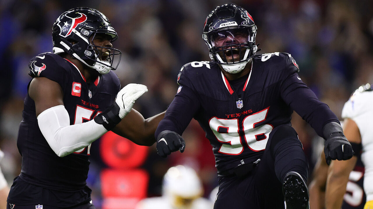 HOUSTON, TEXAS - JANUARY 11: Denico Autry #96 of the Houston Texans celebrates after a sack against the Los Angeles Chargers in the third quarter during the AFC Wild Card Playoffs at NRG Stadium on January 11, 2025 in Houston, Texas.