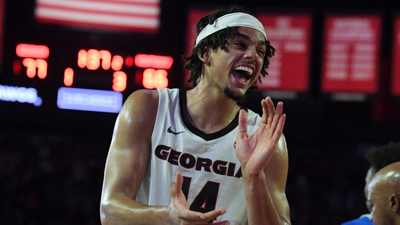 ATHENS, GA - JANUARY 07: Georgia Bulldogs forward Asa Newell (14) reacts to action on the court during the college basketball game between the Kentucky Wildcats and the Georgia Bulldogs on January 07, 2025, at Stegeman Coliseum in Athens, GA.