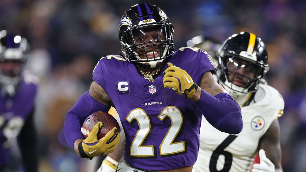 BALTIMORE, MARYLAND - JANUARY 11: Derrick Henry #22 of the Baltimore Ravens runs the ball for a touchdown during the third quarter against the Pittsburgh Steelers during the AFC Wild Card Playoff at M&T Bank Stadium on January 11, 2025 in Baltimore, Maryland.