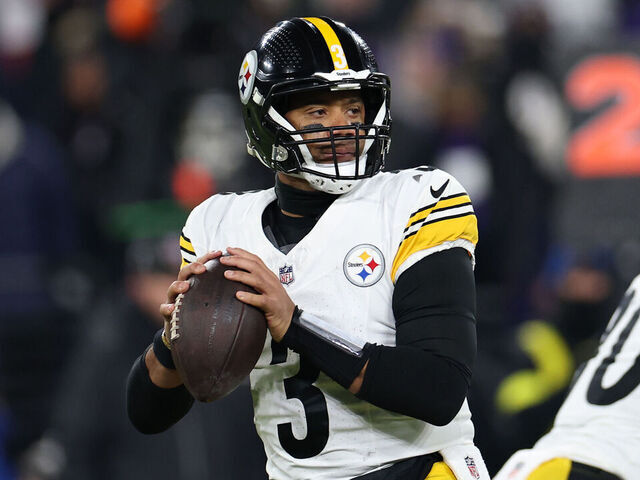 BALTIMORE, MARYLAND - JANUARY 11: Russell Wilson #3 of the Pittsburgh Steelers throws a pass against the Baltimore Ravens during the second quarter during the AFC Wild Card Playoff at M&T Bank Stadium on January 11, 2025 in Baltimore, Maryland.