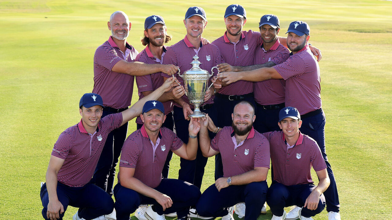 ABU DHABI, UNITED ARAB EMIRATES - JANUARY 12: The victorious Great Britain and Ireland team pose with the trophy (L-R standing) Paul Waring, Tommy Fleetwood, Justin Rose (captain) Laurie Canter, Aaron Rai and Jordan Smith (kneeling L-R) Matthew Jordan, Matt Wallace, Tyrrell Hatton and Tom McKibbin after the final day singles matches of the Team Cup at Abu Dhabi Golf Resort on January 12, 2025 in Abu Dhabi, United Arab Emirates.