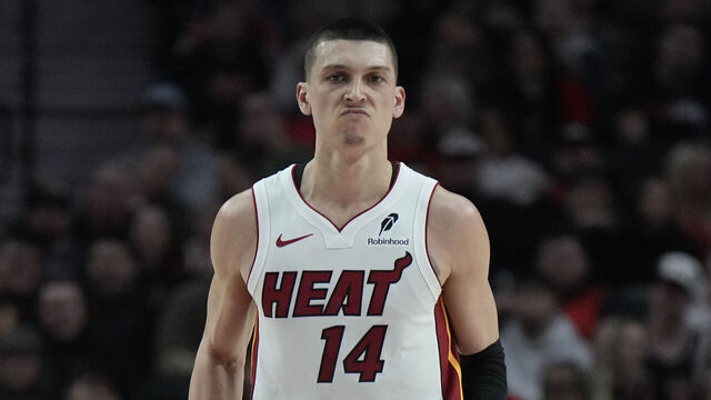 PORTLAND, OREGON - JANUARY 11: Tyler Herro #14 of the Miami Heat reacts after a three point basket during the first half against the Portland Trail Blazers at Moda Center on January 11, 2025 in Portland, Oregon.
