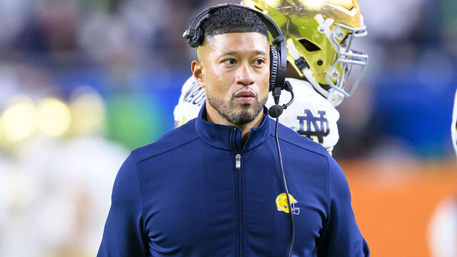 MIAMI GARDENS, FL - JANUARY 09: Head Coach Marcus Freeman of the Notre Dame Fighting Irish watches from the sidelines during the Penn State Nittany Lions versus Notre Dame Fighting Irish College Football Playoff Semifinal at the Capital One Orange Bowl on January 9, 2025, at Hard Rock Stadium in Miami Gardens, FL.