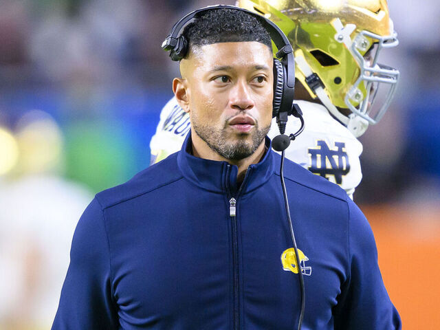 MIAMI GARDENS, FL - JANUARY 09: Head Coach Marcus Freeman of the Notre Dame Fighting Irish watches from the sidelines during the Penn State Nittany Lions versus Notre Dame Fighting Irish College Football Playoff Semifinal at the Capital One Orange Bowl on January 9, 2025, at Hard Rock Stadium in Miami Gardens, FL.
