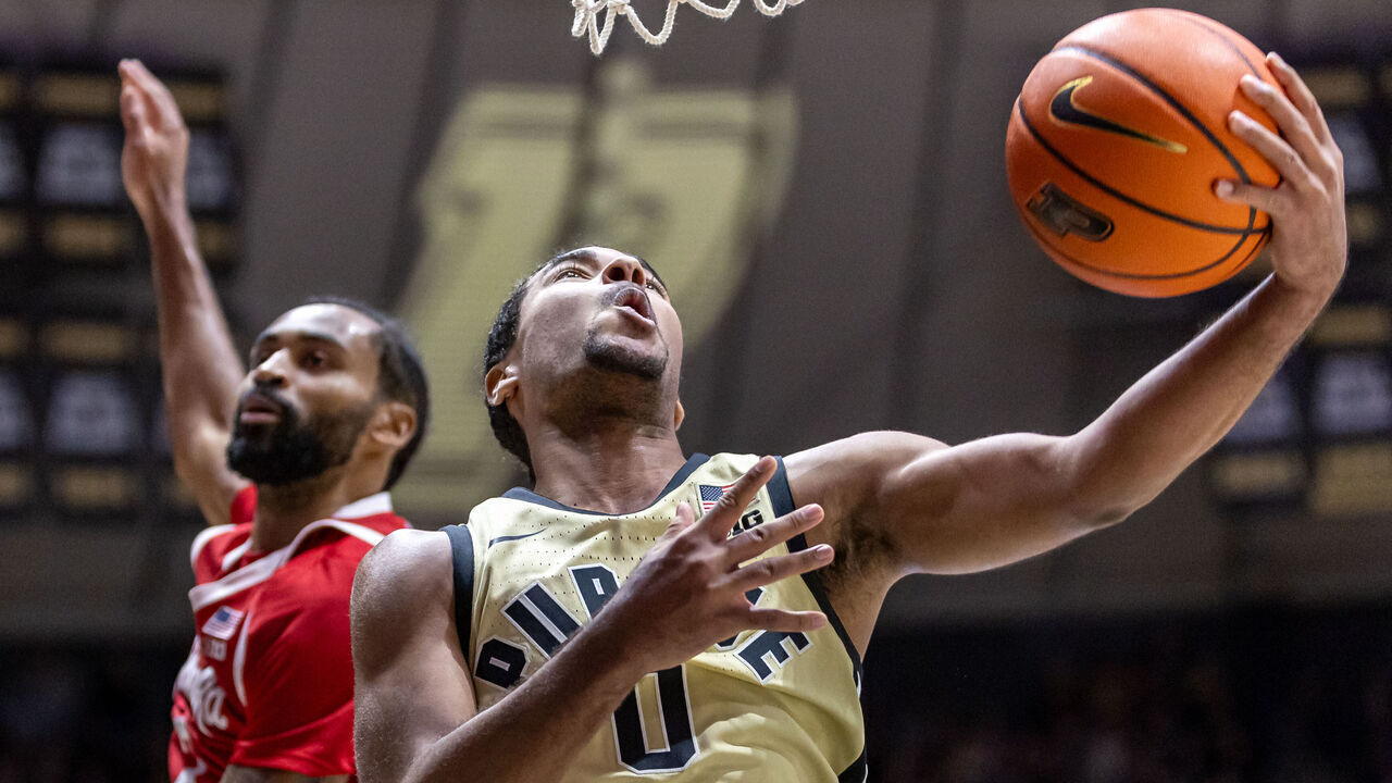 WEST LAFAYETTE, INDIANA - JANUARY 12: C.J. Cox #0 of the Purdue Boilermakers shoots the ball against Brice Williams #3 of the Nebraska Cornhuskers during the second half at Mackey Arena on January 12, 2025 in West Lafayette, Indiana.