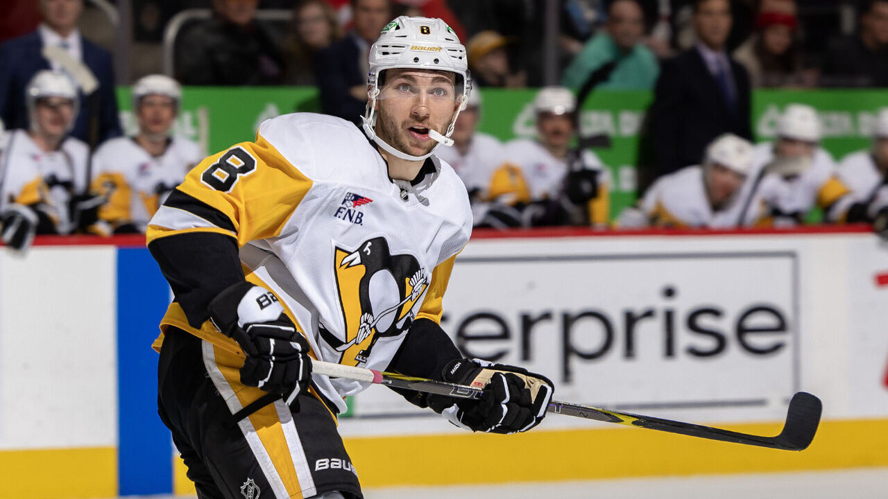 DETROIT, MICHIGAN - DECEMBER 31: Michael Bunting #8 of the Pittsburgh Penguins turns up ice against the Detroit Red Wings during the second period of the annual New Years Eve game at Little Caesars Arena on December 31, 2024 in Detroit, Michigan. Detroit defeated Pittsburgh 4-2.