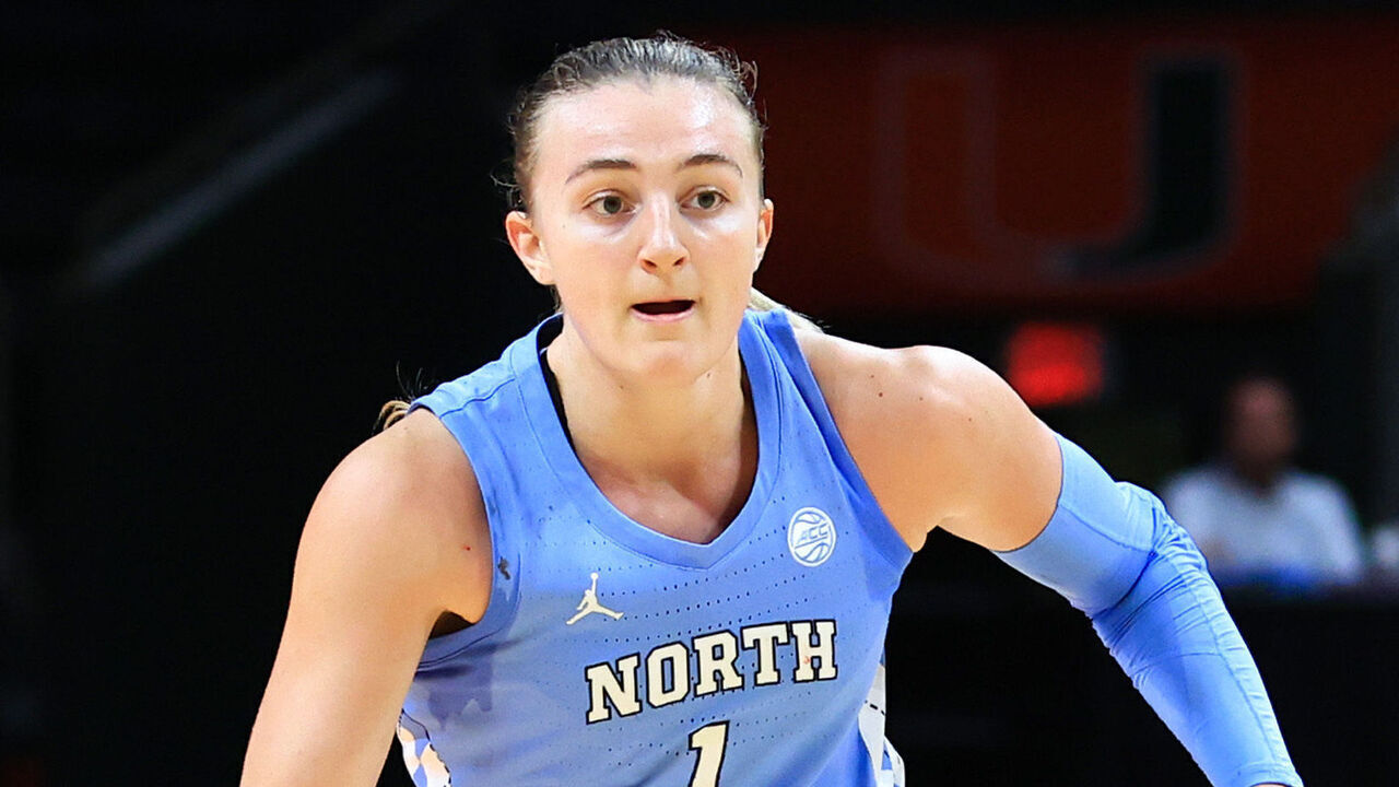 CORAL GABLES, FLORIDA - DECEMBER 29: Alyssa Ustby #1 of the North Carolina Tar Heels dribbles the ball against the Miami Hurricanes during the second quarter of the game at Watsco Center on December 29, 2024 in Coral Gables, Florida.