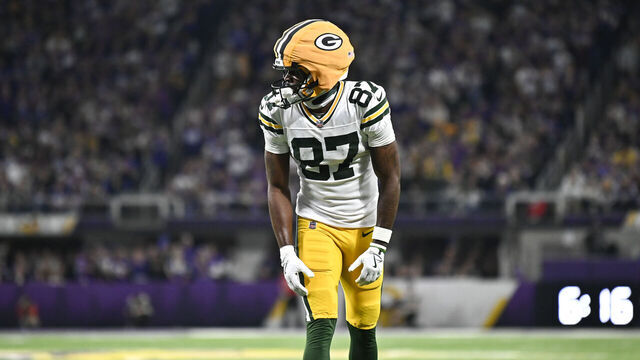 MINNEAPOLIS, MINNESOTA - DECEMBER 29: Romeo Doubs #87 of the Green Bay Packers lines up for a play in the fourth quarter of the game against the Minnesota Vikings at U.S. Bank Stadium on December 29, 2024 in Minneapolis, Minnesota.