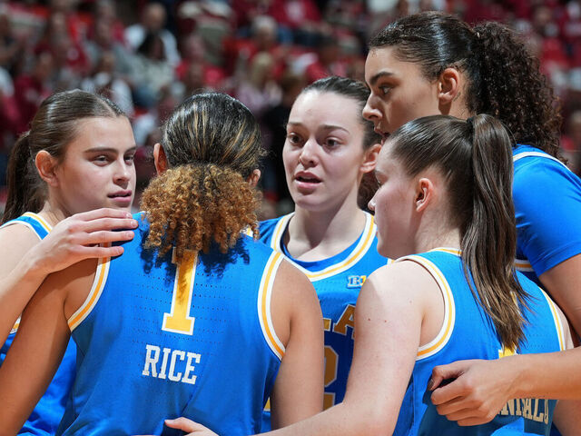BLOOMINGTON, IN - JANUARY 04: UCLA Bruins center Lauren Betts (51) huddles with her team in a women's basketball game against the Indiana Hoosiers on January 4, 2025, at Simon Skjodt Assembly Hall in Bloomington, Indiana.