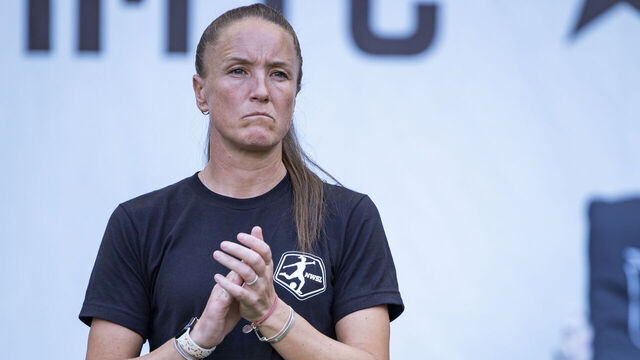 HARRISON, NEW JERSEY - JUNE 19: Casey Stoney Head Coach of San Diego Wave FC claps at the start of the National Women's Soccer League match against the NJ/NY Gotham FC at Red Bull Arena on June 19, 2024 in Harrison, New Jersey.