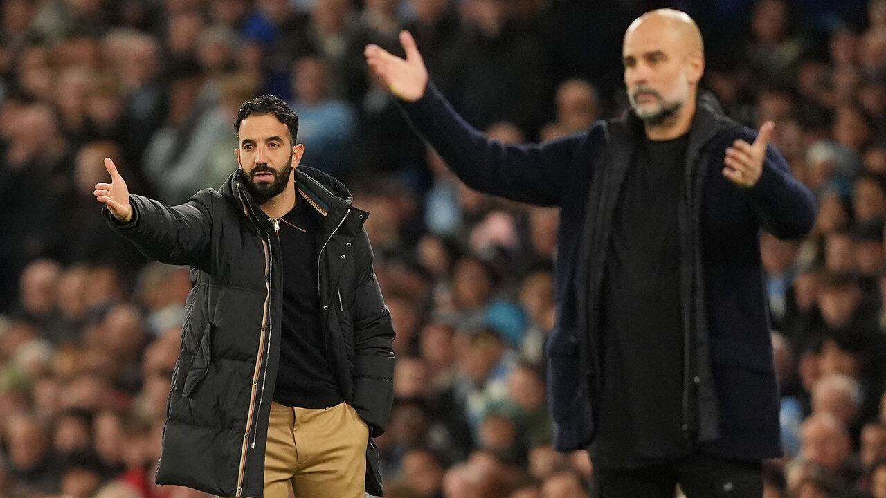 Manchester United manager Ruben Amorim (left) and Manchester City manager Pep Guardiola gesture on the touchline during the Premier League match at the Etihad Stadium, Manchester. Picture date: Sunday December 15, 2024.