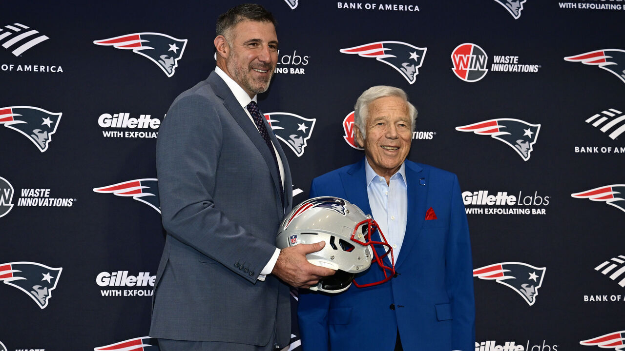 FOXBOROUGH, MASSACHUSETTS - JANUARY 13: Owner Robert Kraft (R) poses for a photograph with Mike Vrabel as Vrabel is announced as head coach of the New England Patriots during a press conference at Gillette Stadium on January 13, 2025 in Foxborough, Massachusetts.