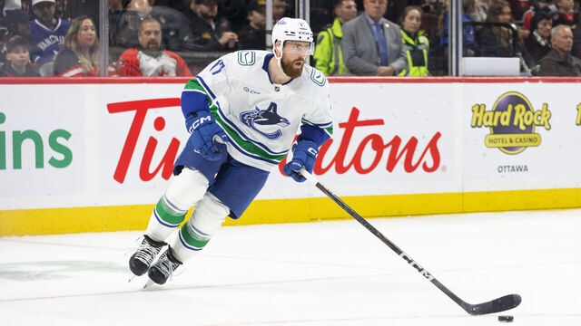 OTTAWA, ON - NOVEMBER 23: Vancouver Canucks Defenceman Filip Hronek (17) skates with the puck during third period National Hockey League action between the Vancouver Canucks and Ottawa Senators on November 23, 2024, at Canadian Tire Centre in Ottawa, ON, Canada.