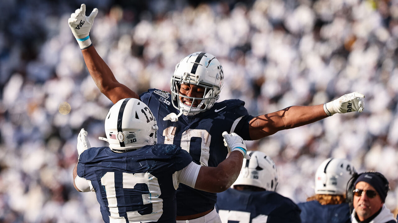 STATE COLLEGE, PA - DECEMBER 21: Kaytron Allen #13 of the Penn State Nittany Lions celebrates with fellow running back Nicholas Singleton #10 after scoring a touchdown against the Southern Methodist Mustangs during the second half at Beaver Stadium on December 21, 2024 in State College, Pennsylvania.