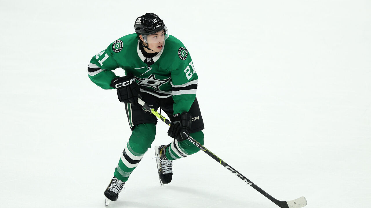 DALLAS, TEXAS - JANUARY 04: Jason Robertson #21 of the Dallas Stars skates with the puck during overtime against the Utah Hockey Club at American Airlines Center on January 04, 2025 in Dallas, Texas.