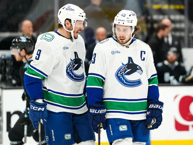 SALT LAKE CITY, UT - DECEMBER 18: Vancouver Canucks Center J.T. Miller (9) and Vancouver Canucks Defenseman Quinn Hughes (43) as seen during an NHL game between the Vancouver Canucks and the Utah Hockey Club on December 18, 2024 at the Delta Center in Salt Lake City, UT.