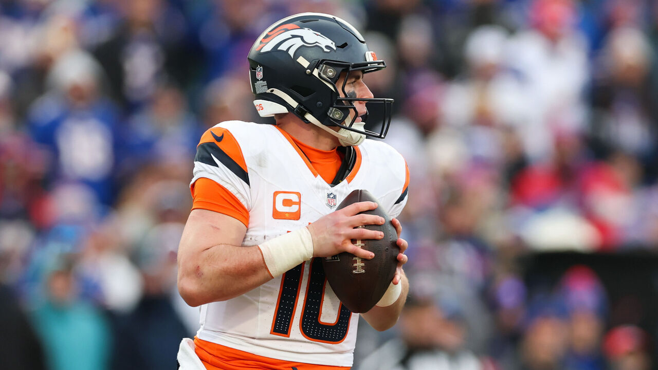 ORCHARD PARK, NEW YORK - JANUARY 12: Bo Nix #10 of the Denver Broncos looks to pass against the Buffalo Bills in the fourth quarter during the AFC Wild Card Playoffs at Highmark Stadium on January 12, 2025 in Orchard Park, New York.