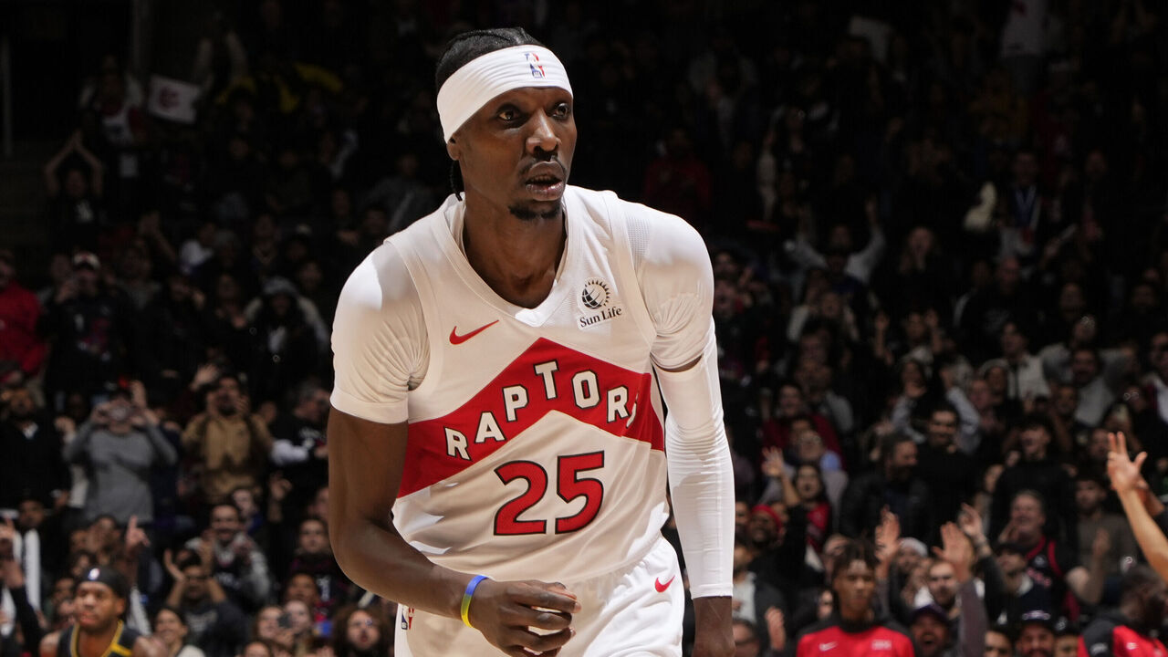 TORONTO, CANADA - JANUARY 13: Chris Boucher #25 of the Toronto Raptors celebrates during the game against the Golden State Warriors on January 13, 2025 at the Scotiabank Arena in Toronto, Ontario, Canada. Mandatory Copyright Notice: Copyright 2025 NBAE