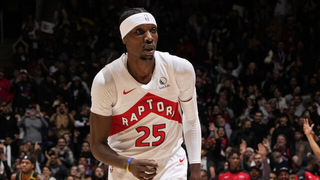 TORONTO, CANADA - JANUARY 13: Chris Boucher #25 of the Toronto Raptors celebrates during the game against the Golden State Warriors on January 13, 2025 at the Scotiabank Arena in Toronto, Ontario, Canada. Mandatory Copyright Notice: Copyright 2025 NBAE