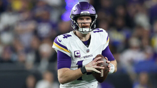 GLENDALE, ARIZONA - JANUARY 13: Sam Darnold #14 of the Minnesota Vikings scrambles during the third quarter against the Los Angeles Rams during the NFC Wild Card Playoff at State Farm Stadium on January 13, 2025 in Glendale, Arizona.